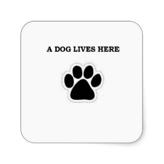 A Dog Lives Here Sticker
