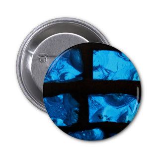 Blue glass chunks with black grout between them pins