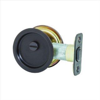 Kwikset 335 10B 335 Round Bed/Bath Pocket Door Lock in Venetian Bronze   Pocket Door Hardware  