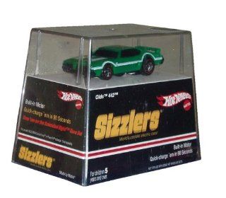 Hot Wheels Sizzlers Green Sports Coupe Olds 442. 164 Scale Oldsmobile car with built in motor. World's coolest electric car. Quick charge Sizzler car in 90 seconds. Charger sold separately. Toys & Games