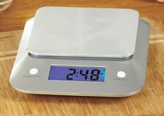 Digital US Mail Scale measures ounces & grams. Compact size 8 " x 6 " x 1 "  Proper weight for proper postage. Includes digital clock. Uses (2) "AAA" Batteries (Not Included) Digital Kitchen Scales Kitchen & Dining