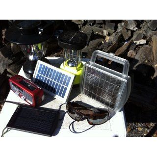 Solar Powered Battery Charger Charges 4 D, C, AA and AAA Batteries Electronics