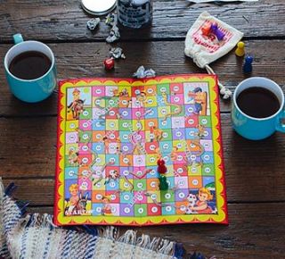 traditional snakes and ladders board game by ellie ellie
