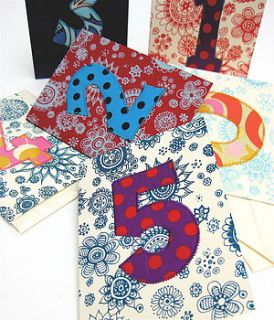 fabric number cards on flower or star design by zozos