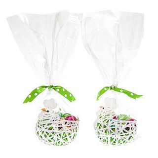 string hen basket filled with chocolate eggs by candyhouse