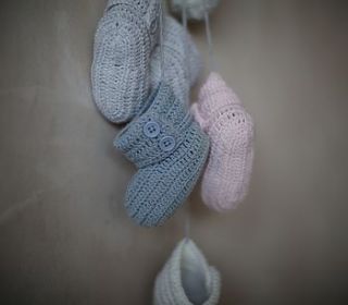 new baby's hand knitted cotton booties by the little tailor