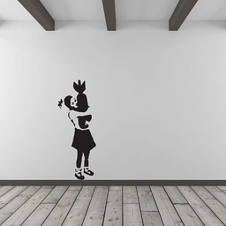 banksy girl hugging bomb vinyl wall art decal by vinyl revolution
