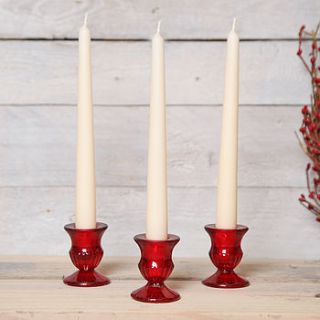 small red glass candle holder by red berry apple