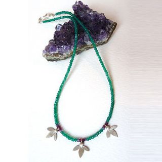 ami leaves on green onyx necklace by blossoming branch