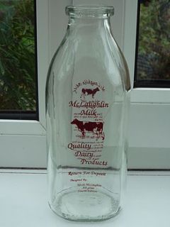 vintage american milk bottle   red print by vintage crates