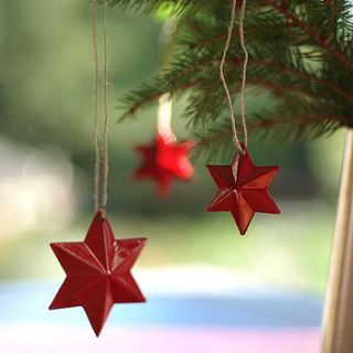 glossy red star decorations by drift living