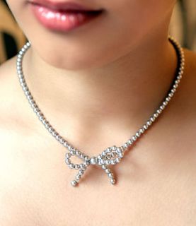 pearl bow necklace by float jewellery