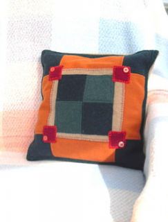 upcycled felt cushion   patchwork squares by carol atkinson textiles