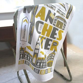 manchester typographic tea towel by susan taylor