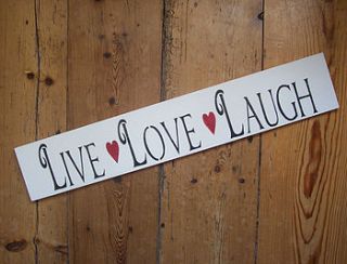 large 'live love laugh" sign by the painted broom company