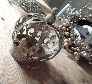 large glitter 'crown' decoration by the hiding place