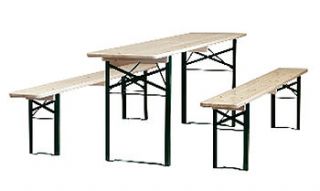 wooden trestle table and benches by green rabbit