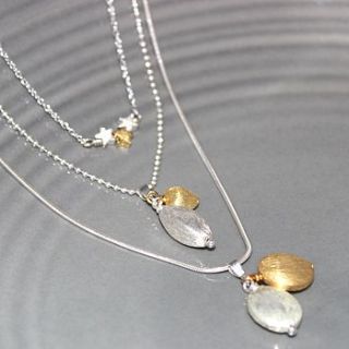 trio of gold and silver necklaces by bish bosh becca