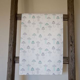 umbrellas and rain clouds tea towel by 'by alex'