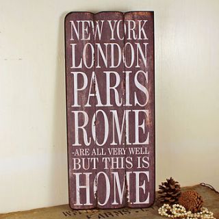 'this is home' wooden wall sign by möa design