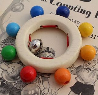 wooden baby rattle rainbow beads and bell by nest