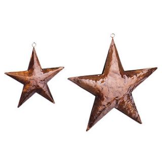 glossy copper star for hanging by lindsay interiors