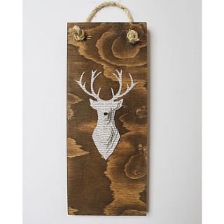 white stag on dark wood by lindsay interiors