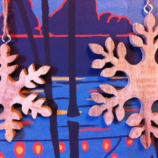 set of three fairtrade wooden snowflakes by the forest & co