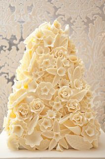 flower bombe four tier wedding cake by delovely cakes