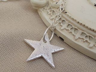 textured silver star necklace by lucy kemp jewellery