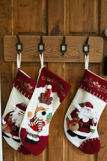 personalised christmas stocking hanger rack by daughters of the revolution