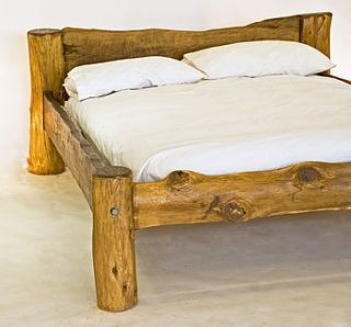 rustic hand crafted king size wooden bed by kwetu