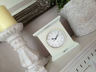 cream elegant mantel clock by the hiding place