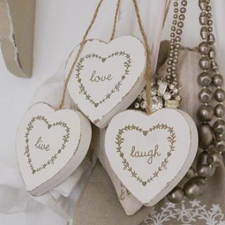 live, laugh, love hanging heart set by the chic country home