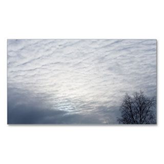 Sun behind clouds business card