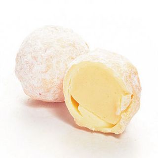 peachy peaches and cream dusted truffles by martin's chocolatier