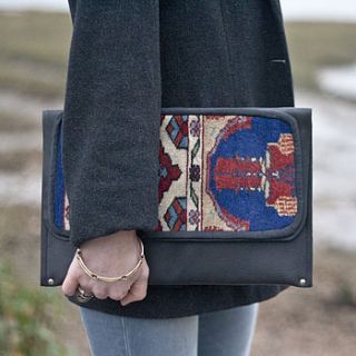 leather and vintage carpet clutch bag by lion house handbags