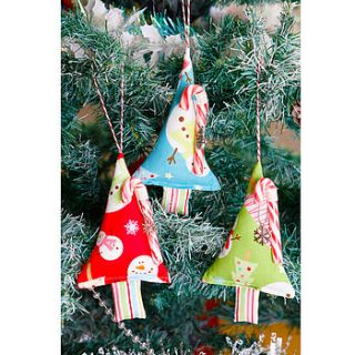 christmas tree with candy cane decoration by red berry apple