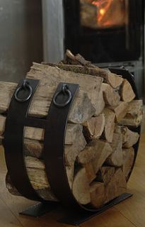 iron log holder by alex pole ironwork