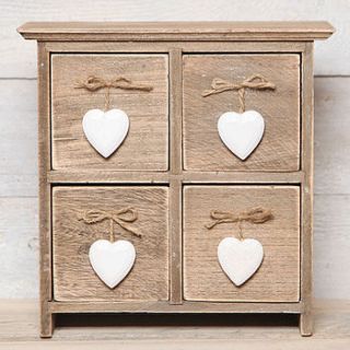 distressed wooden drawers with heart handles by red berry apple