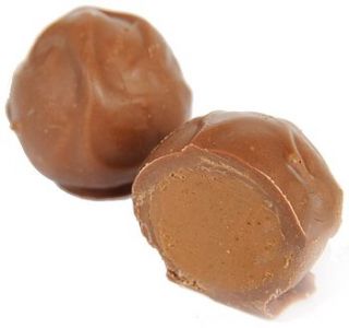 patricia – milk chocolate praline truffle by martin's chocolatier