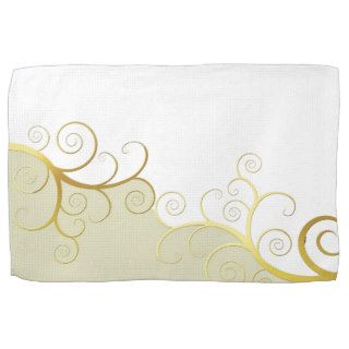Golden swirls on beige and white hand towels