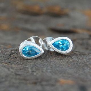 silver and blue topaz tear drop stud earrings by embers semi precious and gemstone designs