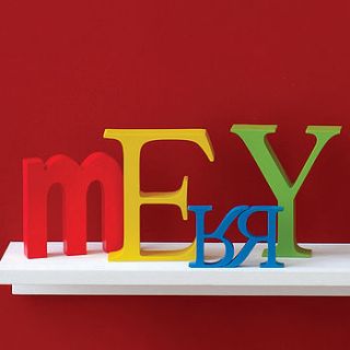 coloured wooden letter by the letteroom
