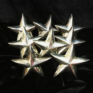 vintage set of eight star napkin rings by iamia