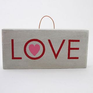 wooden hand painted love sign by edamay