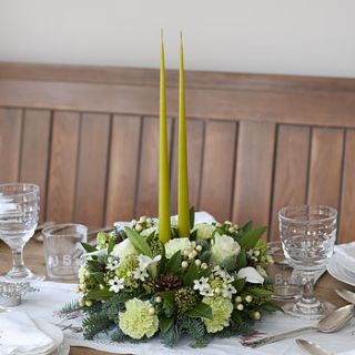 christmas fresh fir and flower centrepiece by the flower studio