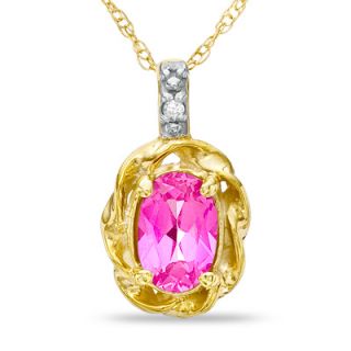 Oval Pink Topaz and Diamond Accent Twist Frame Pendant in 10K Gold