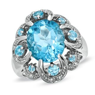 Oval Blue Topaz and Diamond Accent Scroll Ring in Sterling Silver