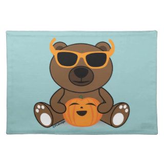 Cool Halloween bear with glasses holding pumpkin Placemats